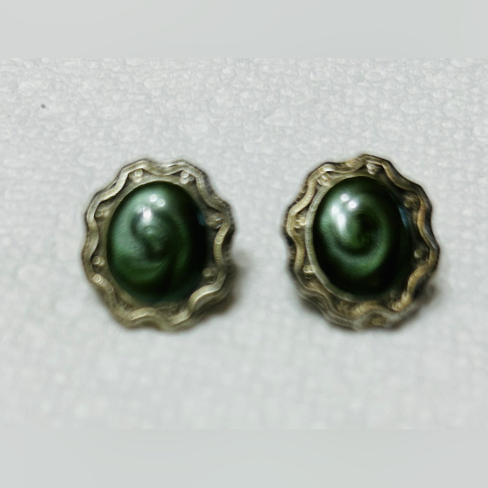 Vintage earrings, clip on, silver tone with greenish/grey swirl stones.